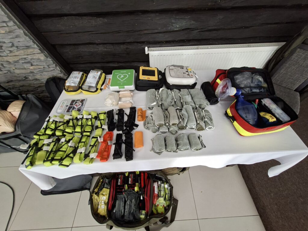 First aid training – equipment: tourniquets, dressings, AED defibrillators and rescue bags