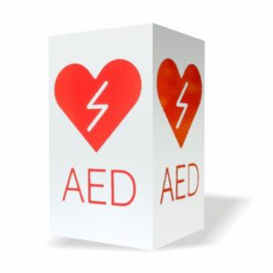 Znak informacyjny AED 3D – wypukły trójkąt z czerwonym logo AED